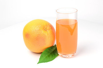 Glass of pink grapefruit juice isolated on white background cutout