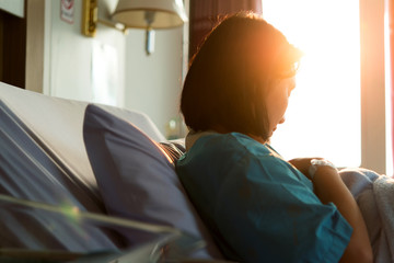 Mothers breastfeed while dating a beautiful golden sunset.