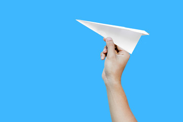 paper aero plane ready to take off as a conceptual picture on blue background