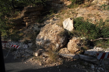 Amatrice - Italy - 26 August 2016 - A boulder fell from the mountain on the road between Norcia and Amatrice after the earthquake of August 24, 2016