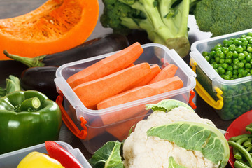 Trays with raw vegetables for freezing.