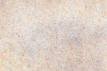cement wall with tiny rock on surface texture, grunge background.