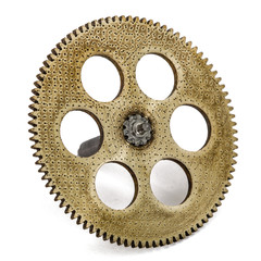 One gear wheel from brass closeup, isolated on white background