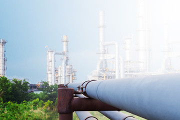 Oil refinery along daytime with blue sky