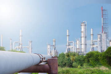 Oil refinery along daytime with blue sky