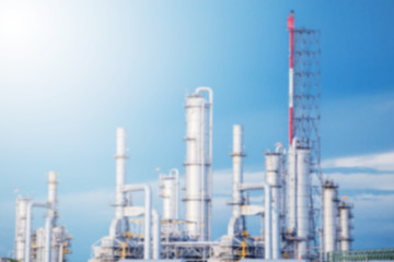 Oil refinery along daytime with blue sky