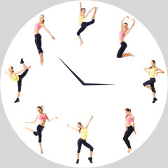 Young girl with perfect sports figure in the circle watch. Sport concept - fitness time.