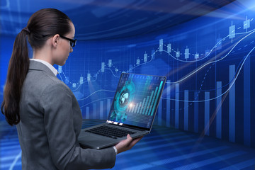Businesswoman in stock exchange trading concept