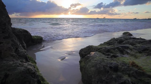 Waves bashing during beautiful sunrise in Punta Cana, Dominican Republic