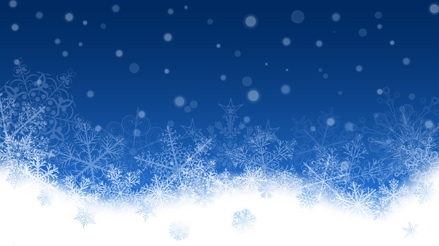 Christmas background of snowflakes and snowdrifts