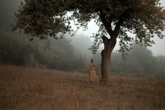girl at lonely tree