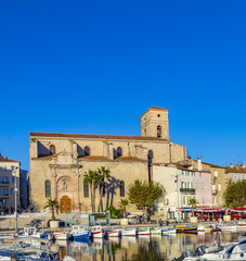 Fototapeta premium Yachts reflecting in blue water in the old town port of La Ciotat