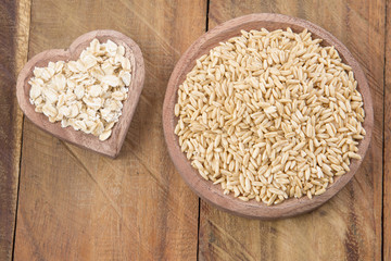 Oats in wooden bowl