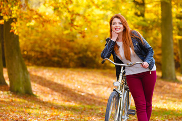 Plakat Fashionable girl with bike.