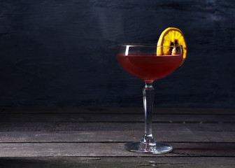 Alcohol cocktail drink on the rustic background
