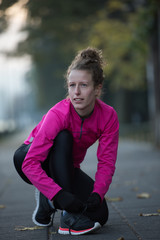 woman  stretching before morning jogging