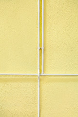Fototapeta premium intersections of the heat pipe on the yellow wall