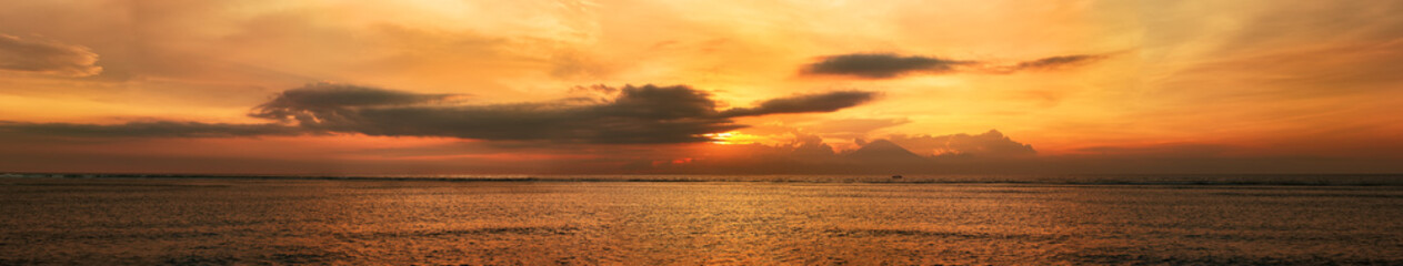 Panoramic sunset over the ocean.