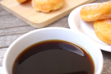 Donut with coffee cup