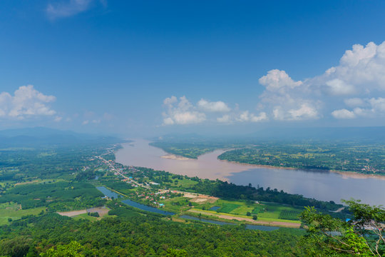 Aerial landscape view of Mekong river with mountain ranges at tw