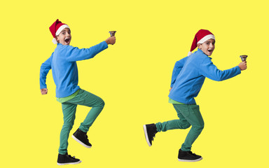 child on color background with christmas hat