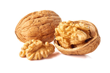 Kernel and whole walnut on white
