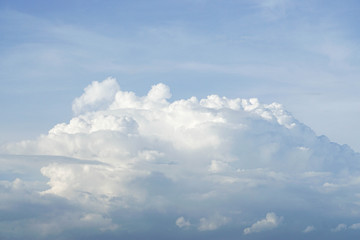big fluffy cloud in blue sky