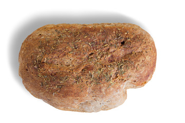 One whole loaf of rye bread isolated on white background. Fresh bread. View from above. Loaf of bread round shape with herbs.