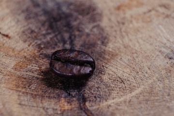 Coffee Bean on wood background with filter effect retro vintage