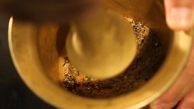 Grinding Spices in an old Spice Grinder