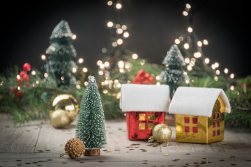 christmas decorations with baubles,tree and toy house.