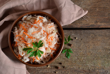 Marinated, sour cabbage with carrots and onions