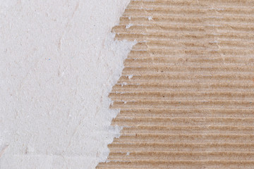 Texture of the brown paper box or cardboard with torn.