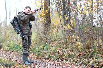 Fototapeta premium man hunter outdoor in autumn hunting