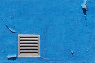 Vent on Old Blue Concrete Wall