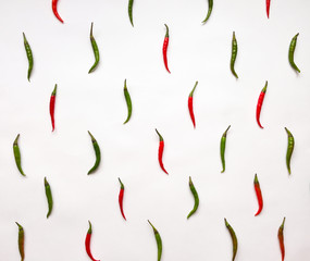 Bright pattern with peppers on white background. Flat lay, view from above