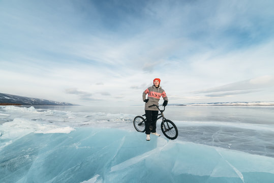 Girl On A Bmx On Ice.