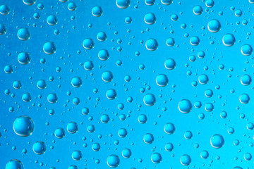 drop of water on blue background