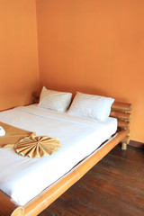 Orange bedroom for relaxing holiday.