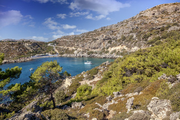 Fototapeta na wymiar Beautiful sea landscape, green hills, turquoise water and white