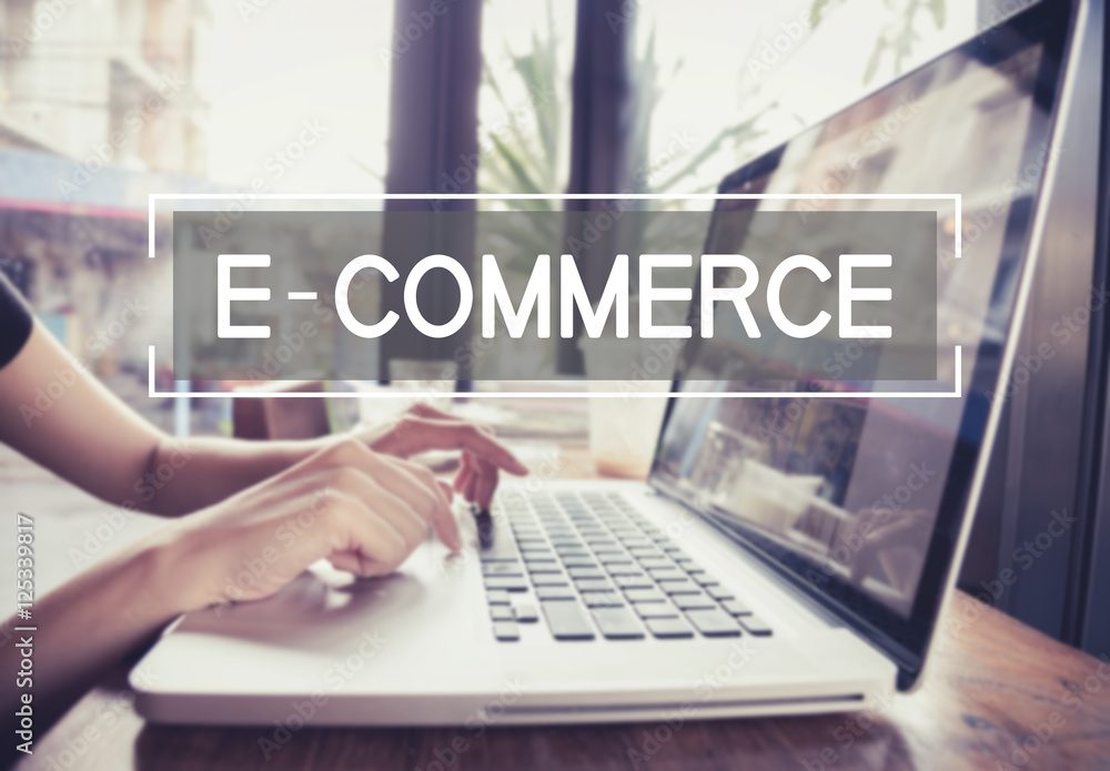 Canvas Prints business hand typing on a laptop keyboard with e-commerce homepage on the computer screen digital em