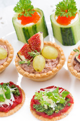 Set of festive Christmas mini appetizers, top view, vertical
