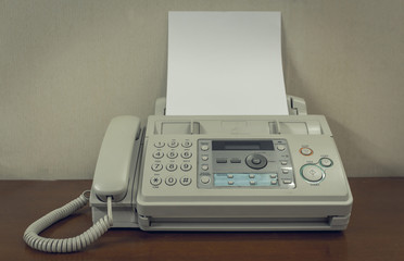 old fax machine on the table - obrazy, fototapety, plakaty
