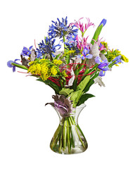 Colorful flower bouquet arrangement centerpiece in vase isolated on white background. Closeup.