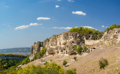 Hollowed out of the rock at the South gate of the medieval town-fortress Chufut-Kale. Bakhchysaray, Crimea