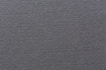 Grey textured wall.
