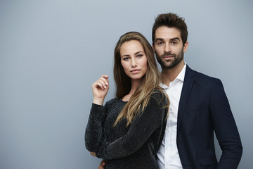 Confident couple in smart clothing, portrait