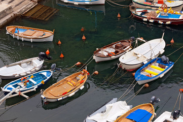 Fototapeta na wymiar Fishing Boats in the Harbor - Liguria Italy