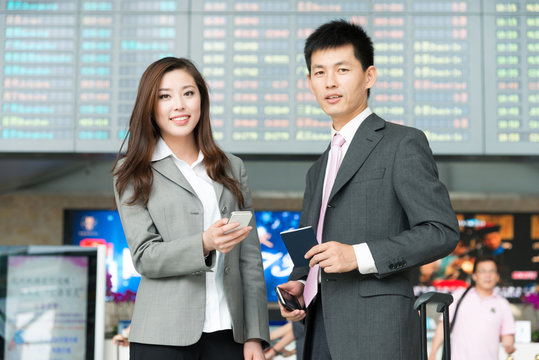 asian young beautiful girl and handsome man in airport
