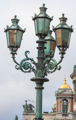 Fototapeta na wymiar Lantern near monument to Nicholas I in Saint Petersburg, Russia architect Montferrand 1856